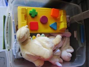 lot 86 image: baby toys and baby shoes