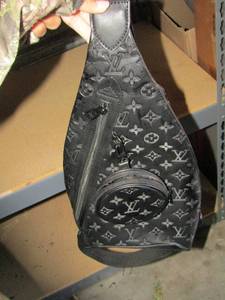 lot 28 image: Louis Vuitton paris mens shoulder bag black