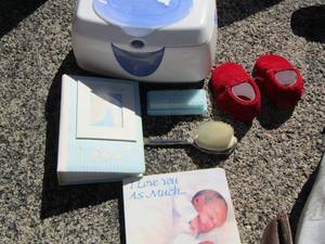 lot 168 image: wipe warmer, baby comb and brush, baby red shoes, photo book, baby book