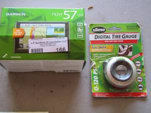 lot 166 image: Garmin gps, digital tire gauge
