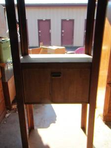 lot 199 image: wooden bookshelf with a pull down door