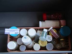 lot 227 image: small jars of mini beads various colors