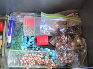 lot 228 image: small colorful beads and necklaces empty containers