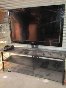 lot 1 image: Sanyo flat screen TV on TV stand works