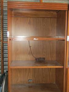 lot 301 image: wooden book shelf has 3 sheves and 2 small doors