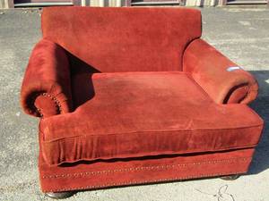 lot 25 image: Red cushion oversized chair Bernhard