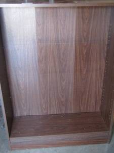 lot 323 image: wooden bookshelf with pegs and shelves