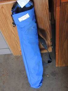 lot 127 image: blue camping chair in bag