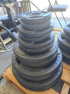 lot 70 image: Full Stack of Northern Lights Plate Weights.  Includes 2 of Each 2.5lb, 5lb, 10lb, 25lb, 35lb, 45lb