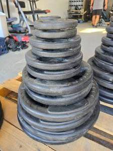 lot 71 image: Full Stack of Northern Lights Plate Weights.  Includes 2 of Each 2.5lb, 5lb, 10lb, 25lb, 35lb, 45lb