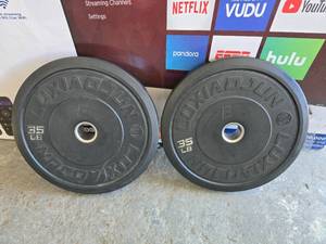 lot 88 image: Lot of 2 Luxiaojun 35lb E1 Bumper Plates
