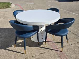 lot 2 image: Beautiful White & Gold Dining Table w 4 Navy & Gold Chairs.  Table Measures 47 Wide & 31 Tall. MATCHES SOFA & END TABLES IN LOTS 9 & 10