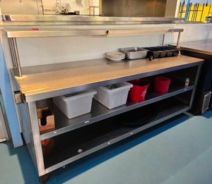 lot 23 image: Long Stainless Steel Rolling Prep Table w Shelf.  Contents Are Included.