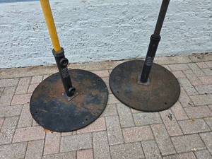 lot 55 image: Lot of 2 Heavy Steel Weighted Umbrella Stands