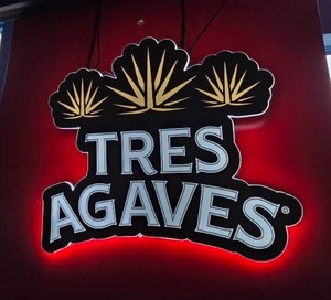 lot 61 image: Tres Agaves Tequila Lighted Wall Sign.  Tested