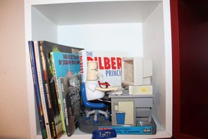 lot 73 image: Dilbert candy dispenser and book, and comic strip books