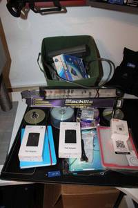 lot 76 image: PoE Adapters, iPad cases, power strips, Blacklight and blank CDs