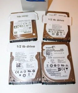 lot 82 image: Hard drives 1 TB, 12 TB and Laptop 500 GB
