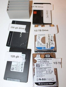 lot 85 image: Hard drives 13 TB, 500 GB, 12 TB, 128 GB, and 256 GB
