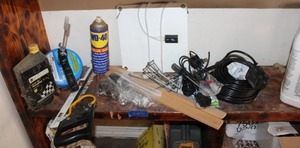 lot 190 image: Tools Hand saw, air hose, motor oil, drain snake