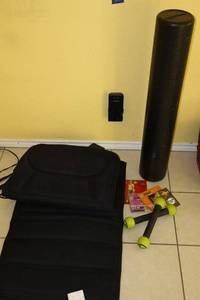lot 159 image: Homedics full body massager, exercise roller, Zumba CDs and toning sticks