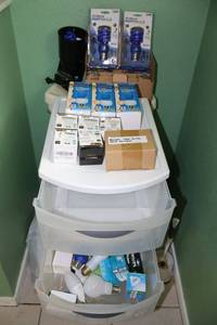 lot 148 image: Misc. light bulbs with 2-drawer plastic container (Pro Track white light looks new)