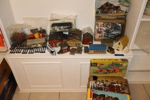 lot 141 image: Vintage train set, track, and buildings