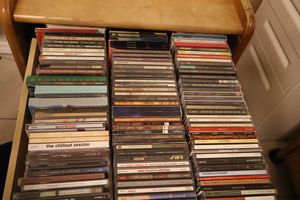 lot 136 image: 3 drawer rolling cabinet full of CDs (did not check every CD)