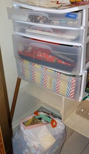 lot 129 image: Gift bagsboxes, labels, and tissue paper with storage container