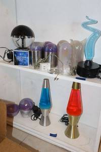 lot 118 image: Misc. plastic lamps, Lasarpod lights, and glass lava lamps