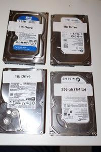 lot 93 image: 1 TB and 14 TB hard drives - 4 total