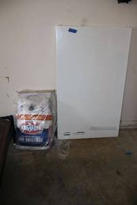 lot 213 image: Kingsford charcoal and Ikea Linnmon white tabletop