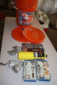 lot 180 image: Master pad locks, Dremel accessory kits, TRUArt pyrography pen kit, Bernzomatic tank, and orange buckets