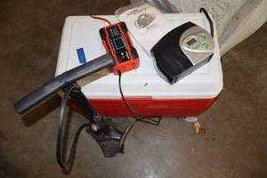 lot 205 image: Air pump, portable jump starter, portable charger, red cooler