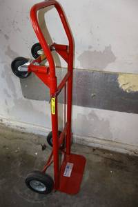 lot 212 image: Red hand truck dolly, 2 to 4 wheel convertible