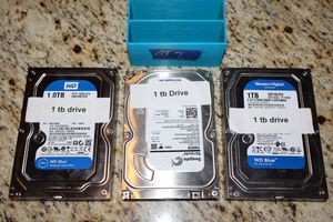 lot 7 image: 1 TB hard drives - 3 total