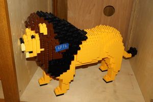 lot 18 image: JEKCA Lion Animal Plastic Building Blocks  Age 14. Measures about 26 long