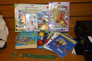 lot 19 image: Painting kits, word games book, coloring books and juggling book and balls