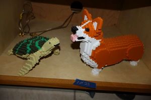 lot 23 image: JEKCA Lion Animal Plastic Building Blocks  Age 14. Corgi and turtle