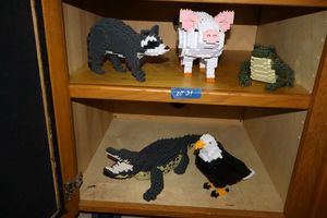 lot 21 image: JEKCA Lion Animal Plastic Building Blocks  Age 14. Pig, eagle, alligator and more