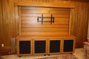 lot 17 image: 8 Foot wide entertainment cabinet. 24.5D, 32base height, 55top height. Can be taken apart, bring tools (there are many screws)