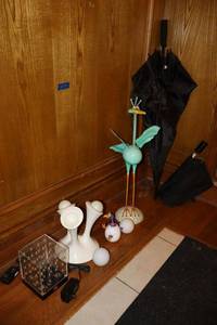 lot 29 image: Metal bird art, Hi-Tec Art lamp, light up balls and umbrellas.