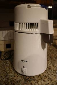 lot 37 image: Vevor distilled water machine, powered on