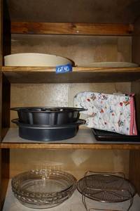 lot 43 image: Stoneware deep dish and plate, cake pans and pie dishes
