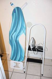lot 60 image: Ironing board, iron, and step ladder