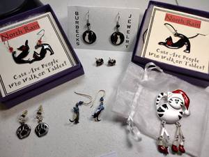 lot 242 image: Jewerly cat themed necklace, pin, and earrings