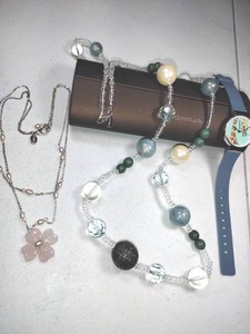 lot 244 image: Jewerly Pink glass flower pendant necklace, Plastic station bead necklace, and animal faced watch with rubber band