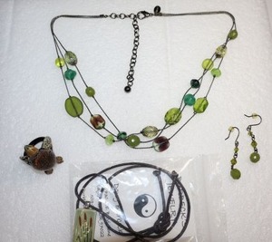 lot 255 image: Jewelry glass turtle ring, ceramic tile pendant necklace by Doug B., green bead necklace and earrings