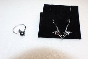 lot 259 image: JewelrySterling silver 925 ring and 925 dolphin earrings
