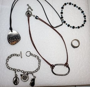 lot 260 image: Jewelry Cirque du Soleil pendant necklace, Charm bracelet, and more